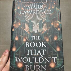 The Book That Wouldn't Burn and the Book That Broke the World Locked Library